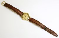 Lot 518 - A ladies' 18ct gold Tiffany and Co. Atlas Quartz strap watch