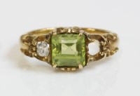 Lot 371 - A late Victorian peridot and diamond three stone ring