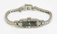 Lot 422 - A ladies' Art Deco diamond set cocktail watch