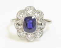 Lot 397 - A sapphire and diamond cluster ring