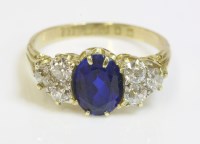 Lot 350 - A synthetic sapphire and diamond seven stone boat shaped ring