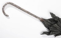 Lot 223 - An Edwardian silver-handled parasol