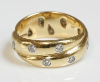 Lot 580 - An 18ct gold diamond set Etoile ring by Tiffany & Co.