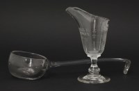 Lot 84 - A glass Ladle