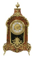 Lot 327 - A boulle mantel clock