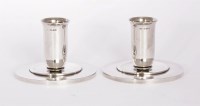Lot 54 - A pair of Georg Jensen silver candlesticks