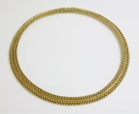 Lot 520 - An 18ct gold woven collar style necklace