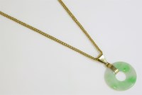 Lot 461 - An 18ct gold jade bi pendant