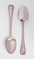 Lot 68 - A set of six Victorian silver old english bead pattern dessert spoons