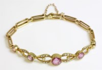 Lot 364 - An Edwardian pink tourmaline and split pearl bracelet