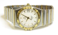 Lot 618 - A gentlemen's bicolour Omega Constellation Quartz bracelet watch
