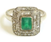 Lot 571 - A Continental emerald and diamond cluster ring