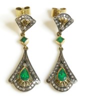Lot 569 - A pair of Continental emerald and diamond drop earrings