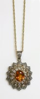 Lot 487 - A Continental citrine and diamond pendant