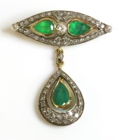 Lot 568 - A Continental emerald and diamond set bar brooch