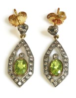 Lot 482 - A pair of Continental Art Deco style peridot and diamond drop earrings