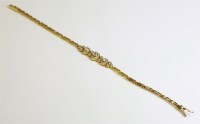 Lot 524 - A Continental diamond set bracelet