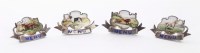 Lot 228 - A set of four Edwardian silver and enamelled menu holders