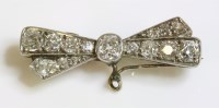 Lot 396 - An Art Deco diamond set bow brooch or fob pin