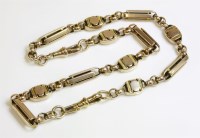 Lot 381 - A Victorian gold trombone and oval link watch chain