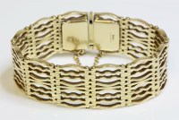 Lot 481 - A 9ct gold nine row