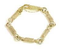 Lot 513 - A 9ct two colour gold bracelet