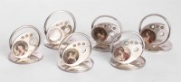 Lot 227 - A set of six Edwardian silver menu holders