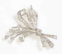 Lot 424 - A 14ct white gold diamond set spray brooch