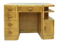 Lot 536 - An Art Deco kneehole desk