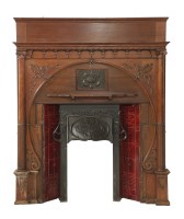 Lot 454 - An Art Nouveau oak fireplace