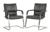Lot 709 - A pair of Figura leather desk chairs