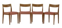 Lot 699 - A set of four teak dining chairs