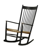Lot 694 - A J16 ebonised rocking chair
