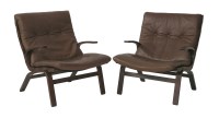 Lot 809 - A pair of stained bentwood and chocolate leather upholstered armchairs