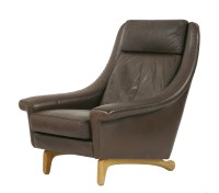Lot 637 - A chocolate brown armchair
