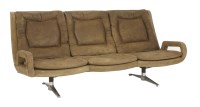 Lot 680 - A leather three-seater settee