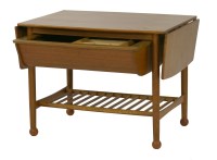 Lot 686 - A teak drop-leaf coffee table