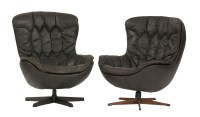 Lot 687 - A near pair of chocolate leather loungers