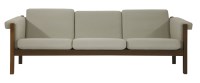 Lot 740 - A fumed oak three-seater settee