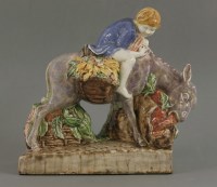 Lot 115 - A pottery figure