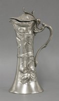Lot 193 - A WMF Art Nouveau pewter ewer and lid