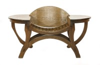 Lot 477 - An unusual oak Arts and Crafts reading chair