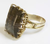 Lot 79 - A Continental single stone smokey quartz gold ring