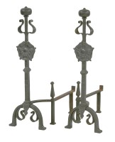 Lot 456 - A pair of Arts and Crafts wrought iron fire dogs