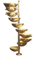 Lot 748 - A polished steel spiral staircase or shelves