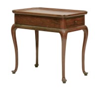 Lot 65 - A padouk wood tea table