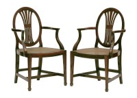 Lot 75 - A pair of George III rosewood elbow chairs