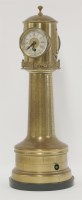 Lot 263 - A Victorian brass lighthouse clock