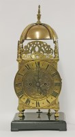 Lot 264 - A brass 'lantern' clock