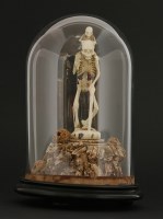 Lot 57 - A bone and cork group